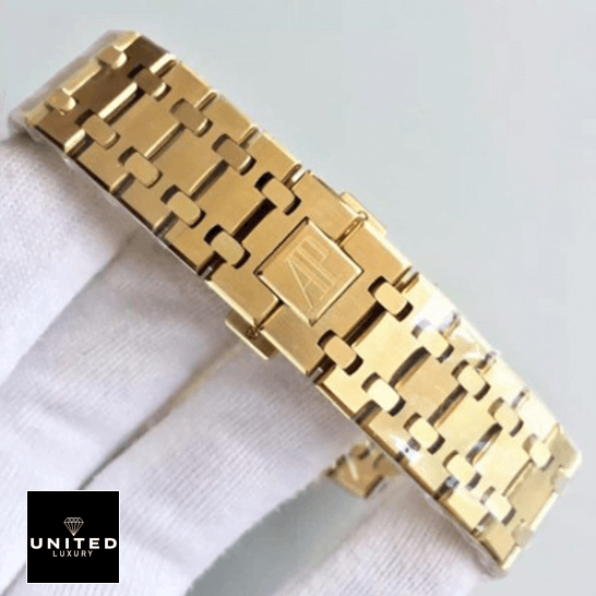 Audemars Piguet 26320 Gold Bracelet Inspired closed clasp on the white glove hand