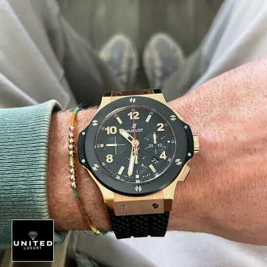 Hublot Big Bang Black Bezel Gold Case Inspired on the man wrist