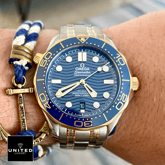 Omega Seamaster Diver 300m Gold Blue Dial Inspired on the man wrist