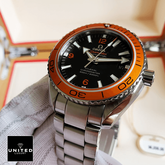 Omega Orange Bezel Black Dial Inspired steel bracelet in the box