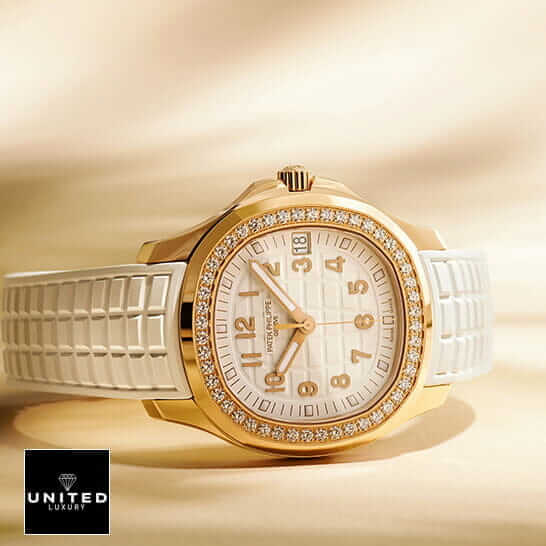 Patek Philippe Aquanaut Diamond Bezel White Dial Inspired rose gold background