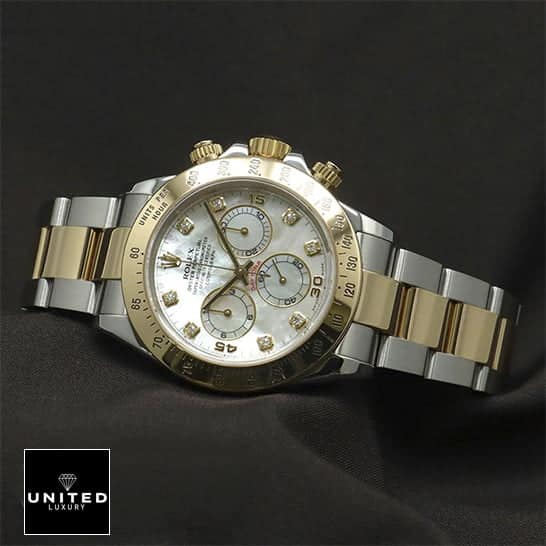 Rolex Daytona Two Tone White Dial 116523 Inspired on the black table