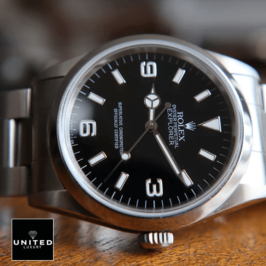 Rolex Explorer 124270 Stainless Steel Case and Bezel Inspired on a wooden table