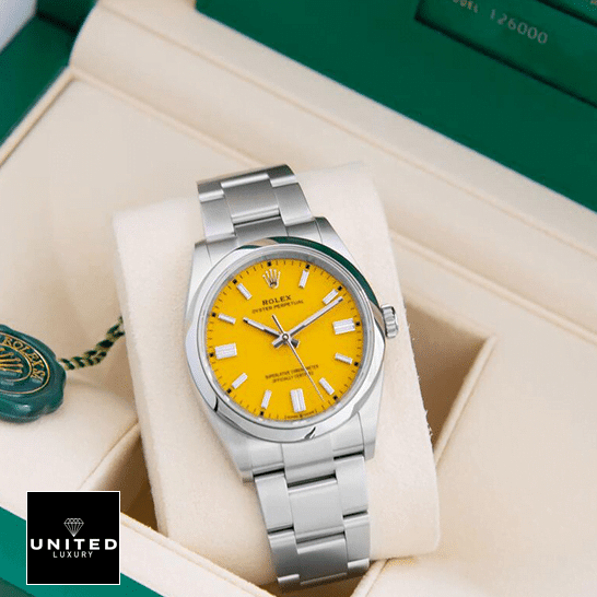 Rolex Perpetual 124300 Oyster Yellow Dial Inspired in the Green Box