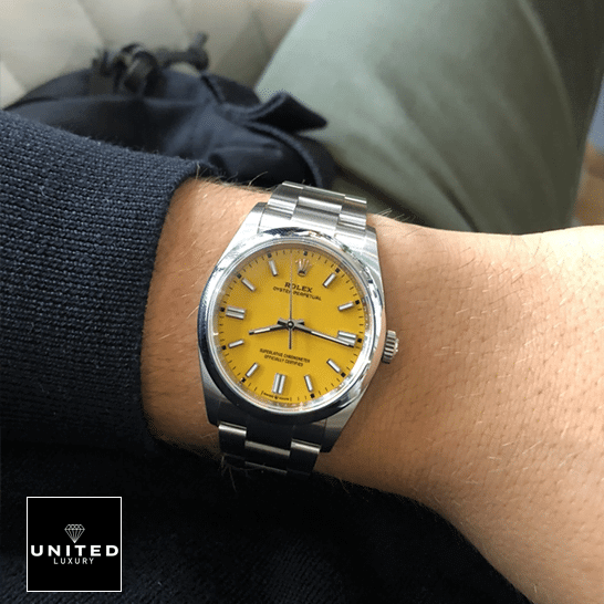 Rolex Perpetual 124300 Yellow Dial Stick indices Inspired on his arm